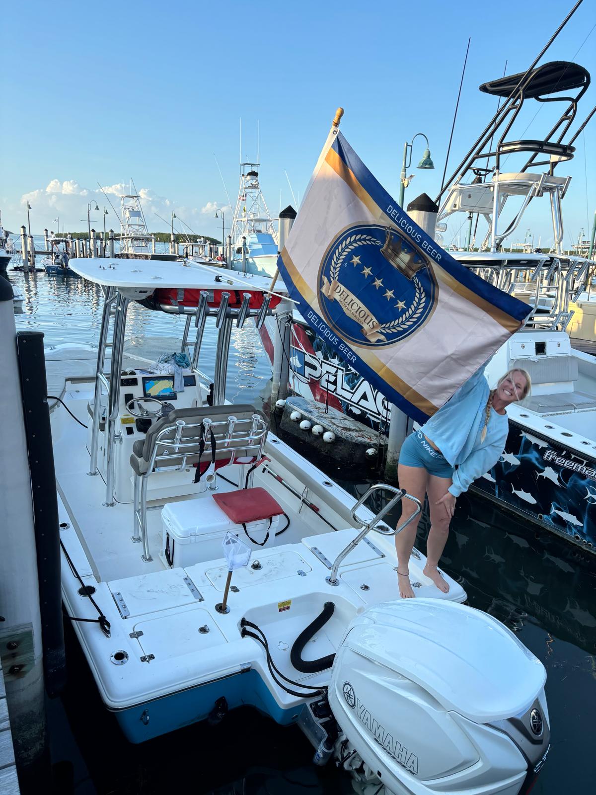 Delicious Beer flag on boat at marina